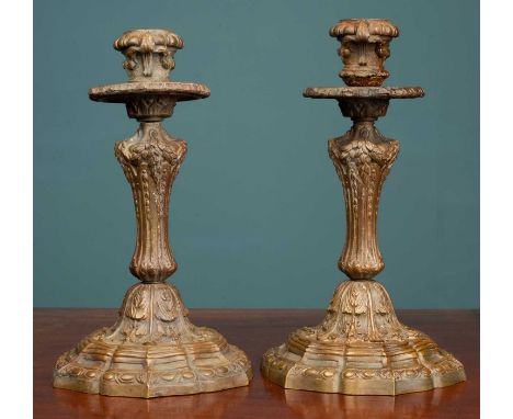 A pair of ornate bronze candlesticks, 23cm x 14cm (each) (2)Good used condition.