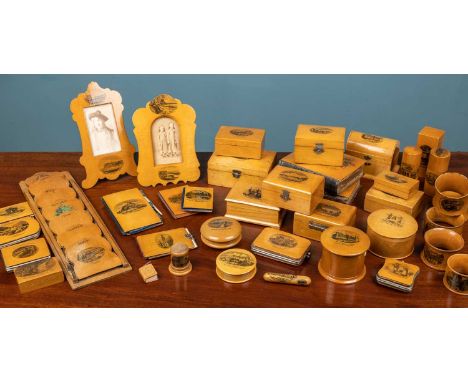 An assortment of French Mauchline ware, souvenirs from various French towns of historical significance including Paris, Breta