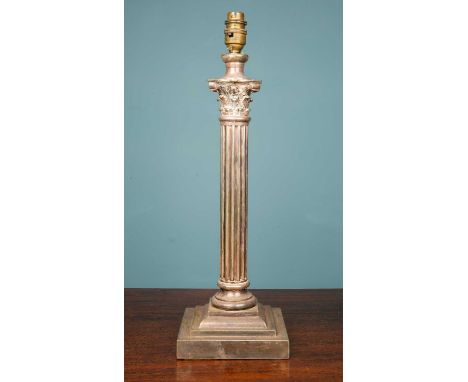 A silver plated table lamp of corinthian column form, possibly originally an oil lamp, 47.5cm highSome wear to the silver pla