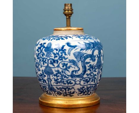A porcelain table lamp constructed from a Chinese blue and white ginger jar with giltwood mounts, 20cm diameter x 30cm high t