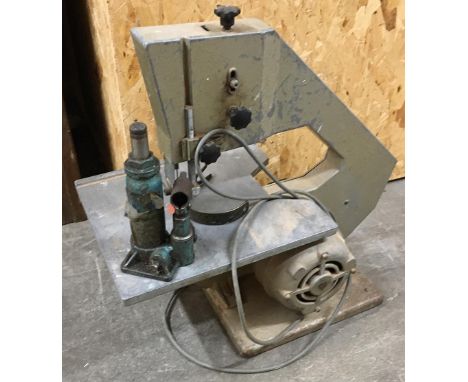 A vintage table jigsaw and a small jack 
