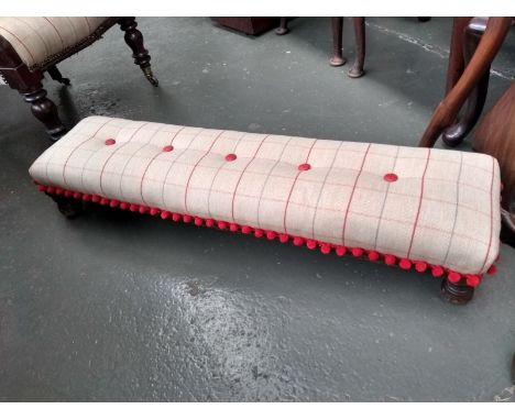 A newly upholstered 19th century low button footstool, red pom pom trim, 108x27x21cmH