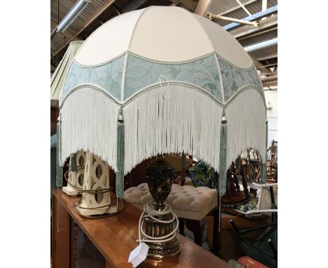 A cast metal table lamp, with large tasselled shade, height to top of shade approx. 70cmH 