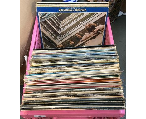 A mixed box of vinyl lps to include Beatles (1967-70), Sky, UB40, Grace Jones, Donovan, Ultravox, John Haiatt, Mike Oldfield,