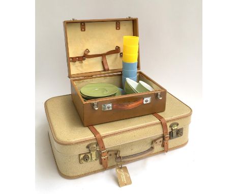 A Coracle picnic case containing a small quantity of Melaware melamine tableware; together with six drinking cups; together w