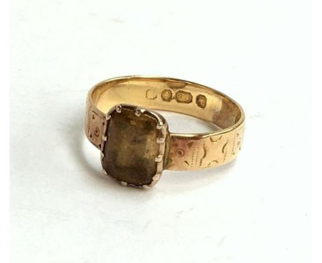 Pretty 18ct gold ring set with a citrine on an engraved band, gross weight 2.9g,size L 