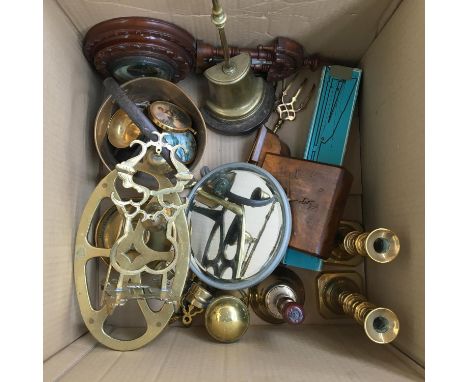 A mixed lot of brass items to include trivet, candlesticks, bell, tankard, doorstop etc, art deco mantel clock and other item