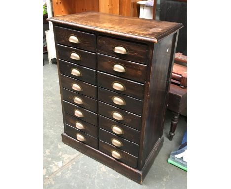 A stained pine vintage filing chest of two sets of eight drawers, on plinth base, 70x40x95cmH 