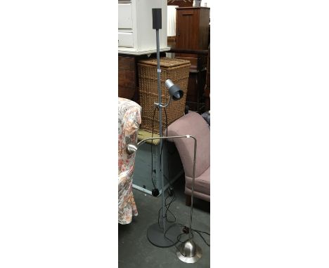 A brushed steel floor standing posable lamp; together with one other 