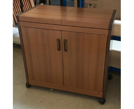 A Philips HL6232 hostess trolley, with pyrex warming dishes, cupboard below, with spare parts and instruction manual 