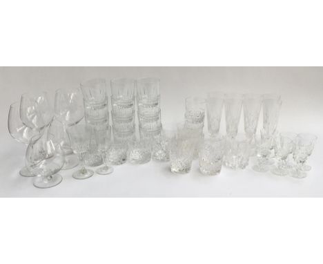 A mixed lot of glass to include a set of 12 Arcoroc tumblers; together with other cut glass whisky tumblers; champagne flutes