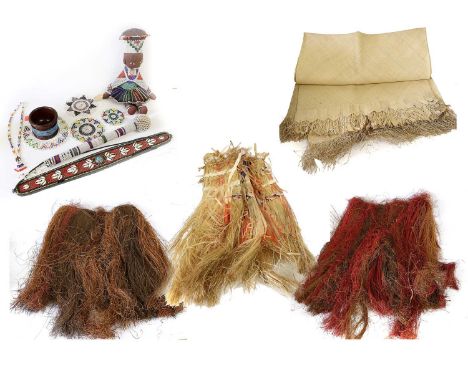 A Collection of Mid-20th Century South African Zulu Beadwork, including a traditional stuffed felt female doll with beadwork 