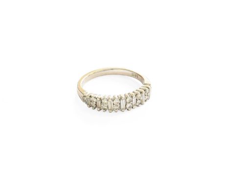 A Diamond Half Hoop Ring, baguette cut diamonds alternating with pairs of round brilliant cut diamonds, flanked by single bri