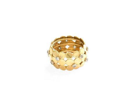 A Diamond Ring, of yellow foliate design, set throughout with old cut and eight-cut diamonds in white rubbed over settings, f