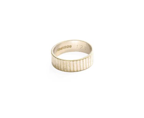 An 18 Carat White Gold Band Ring, finger size NGross weight 4.2 grams.