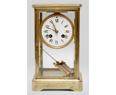 A Brass Four Glass Striking Mantel Clock, circa 1900, twin barrel movement striking on a bell, 26cm highwith pendulum, it has