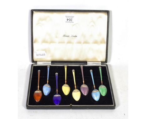 A set of silver gilt and enamel coffee spoons, Turner &amp; Simpson, Birmingham 1956, retailed by Harrods, in a fitted case 
