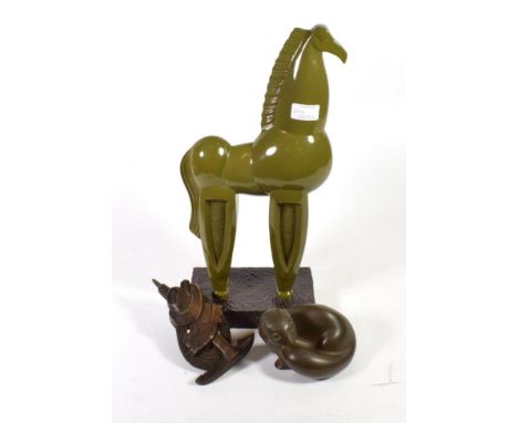 Richard Fisher (Contemporary) a model of an otter; and another of a climbing axe, rope and hat, both signed; and a large 20th