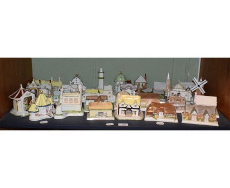 A shelf of Coalport Cottage models