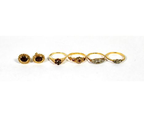 Two rings (a.f.) (marks rubbed), finger sizes K and M1/2; a 9 carat gold gem set ring, finger size L1/2; a 22 carat gold seed