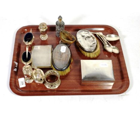 Assorted silver wares including a cigarette box; condiments; a napkin ring; hairbrushes etc 