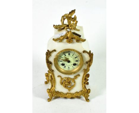 An ormalu mounted alabaster striking mantel clock with French movement, twin barrel movement, striking on a bell, with pendul