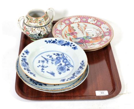 A Chinese famille rose figural plate, Qianlong; together with another, floral design, bearing Guest &amp; Gray sticker; with 