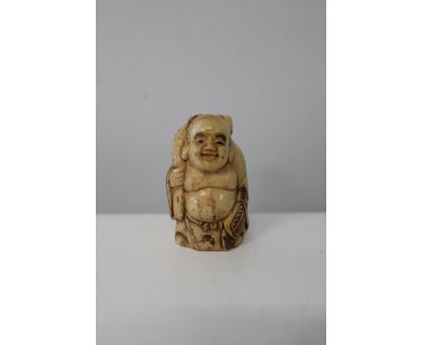 A hand carved &amp; signed Netsuke 