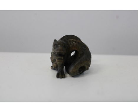 A hand carved &amp; signed Netsuke 