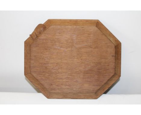 A vintage Robert "Mouseman" Thompson cheese board. 