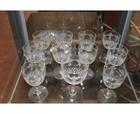 A shelf of quality fine lead crystal glasses with fine etched design. collection only 