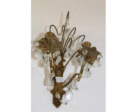 A vintage brass &amp; glass drop candle wall light 
