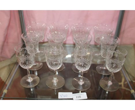 A shelf of quality fine lead crystal glasses with fine etched design. collection only 