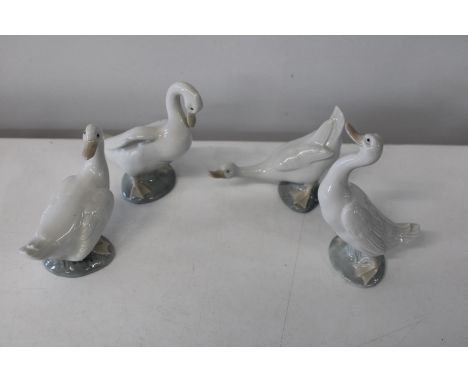 Four Nao geese figures 