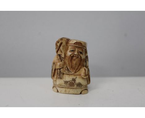 A hand carved &amp; signed Netsuke 
