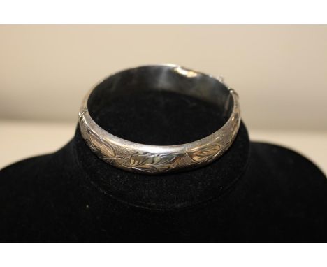 A hallmarked silver bangle 