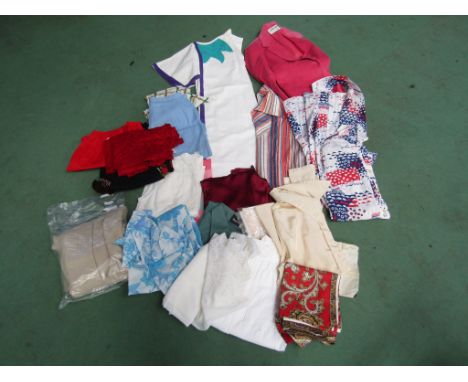 A box of mainly 1960s ladies everyday clothing, shorts, dresses, blouses including an iconic "Simon" label green cotton t-shi