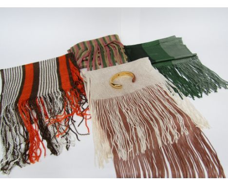 Four 1970's synthetic knitted scarves together with a yellow metal bangle stamped Lacamera