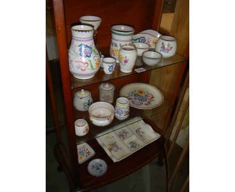 Three shelves of Poole pottery. COLLECT ONLY.