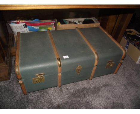 A large vintage wood bound travel trunk in very good conditon 