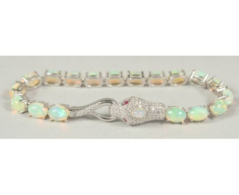 A silver real opal snake bracelet, in a velvet box.