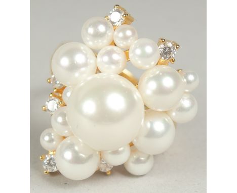 A silver gold plated cluster pearl ring, size P, in a box.