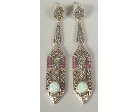 A pair of silver marcasite ruby and opal drop earrings in a box.