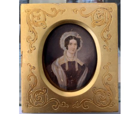 A portrait miniature of a lady, in decorative gilt frame