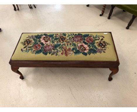 A tapestry stool