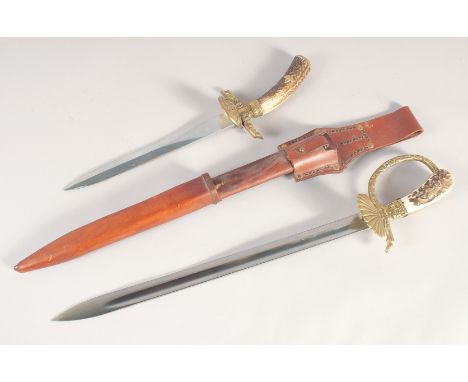 A HUNTING TROUSSEAU, mid-20th century, comprising sword with straight fullered 16in blade, brass shell guard &amp; knucklebow