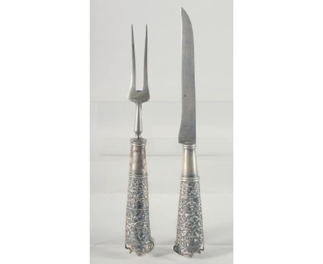 FRIEDRICH HERDER ARR SOHN, a silver handle knife and fork, 12" long.