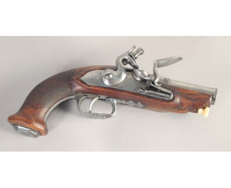 A FRENCH FLINTLOCK POCKET PISTOL, circa 1810, octagonal to round 50 bore 3.25 in barrel, lock signed 'Pegnet a Paris', swan n