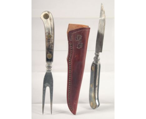 A KNIFE AND FORK, with bone handle, 9" long, in a leather case.