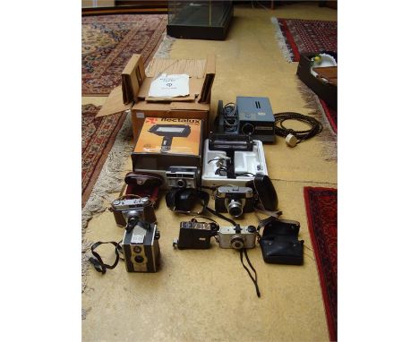 Photographic Interest.  A selection of cameras, flashes and a slideshow projector.  Camera models include a Coronet Twelve-Tw